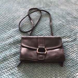 A beautiful Fossil leather purse NWOT.